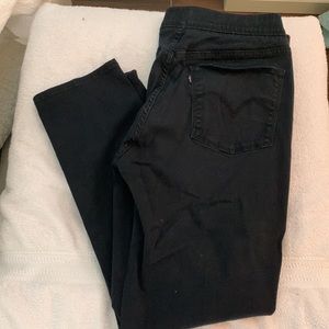 Black Levi jeans. Straight, slim legs. Pull on with some stretch. Pockets fr/bk